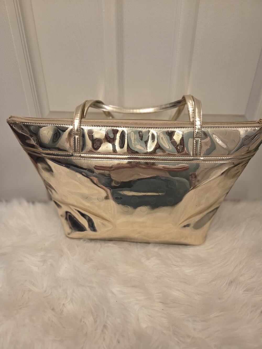 Kate Spade NWOT Metallic Gold PVC Tote Bag with Bow Accent.